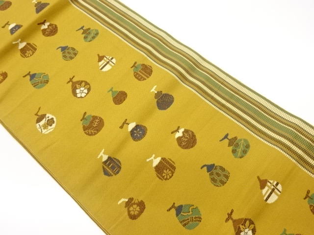 本場筑前博多抽象干し柿に花々・幾何学模様織出し名古屋帯